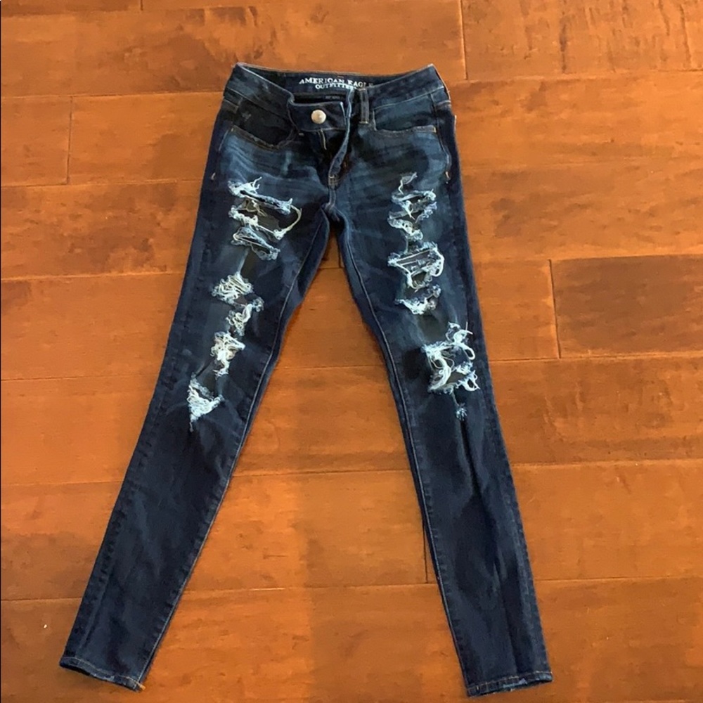 american eagle dark blue ripped jeans, size zero